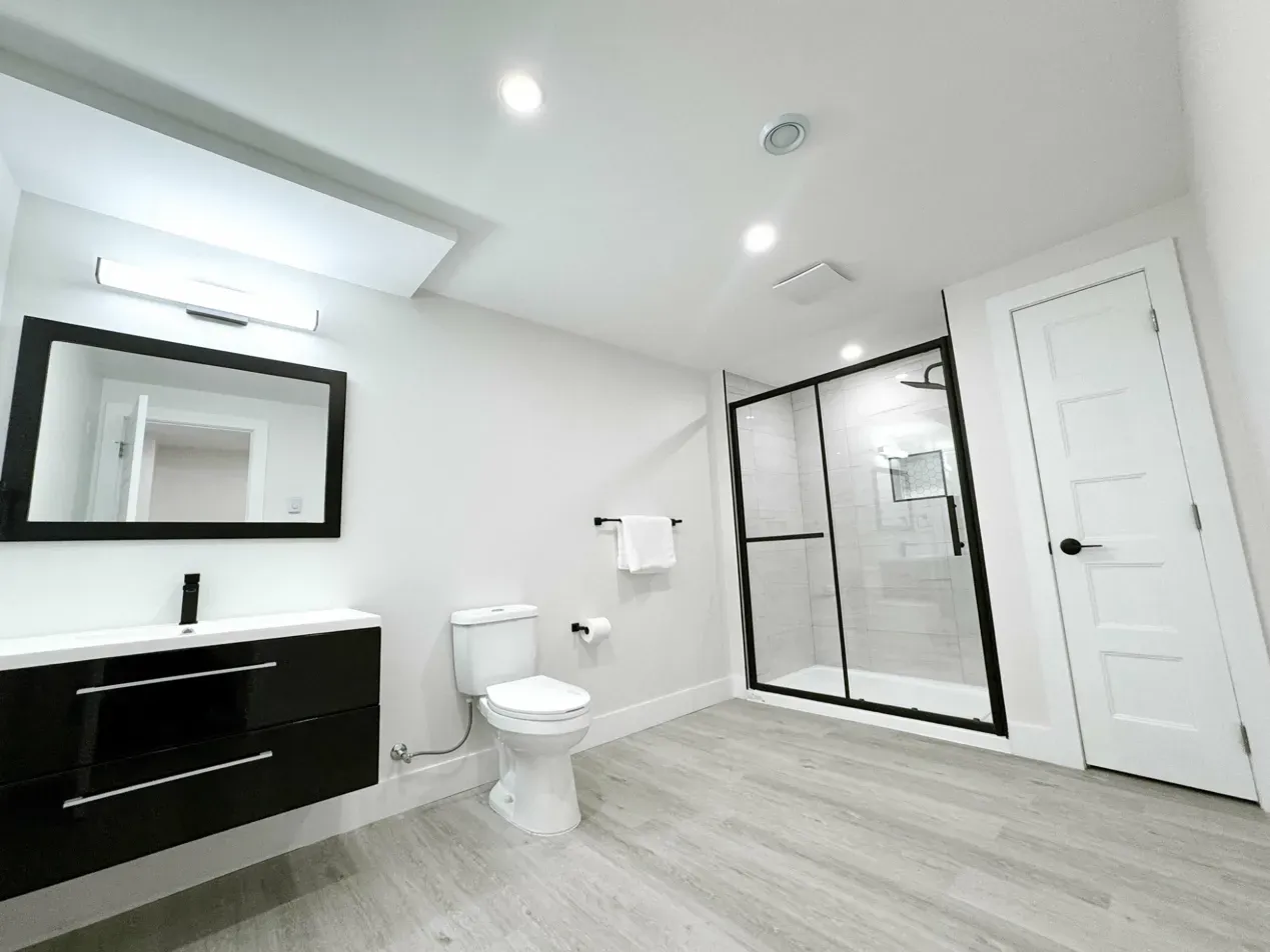 Finished basement bathroom in legalized suite - Niagara Falls by PARAHOMES